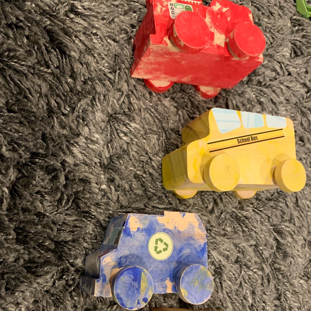 Lot of 4 painted wooden toy cars